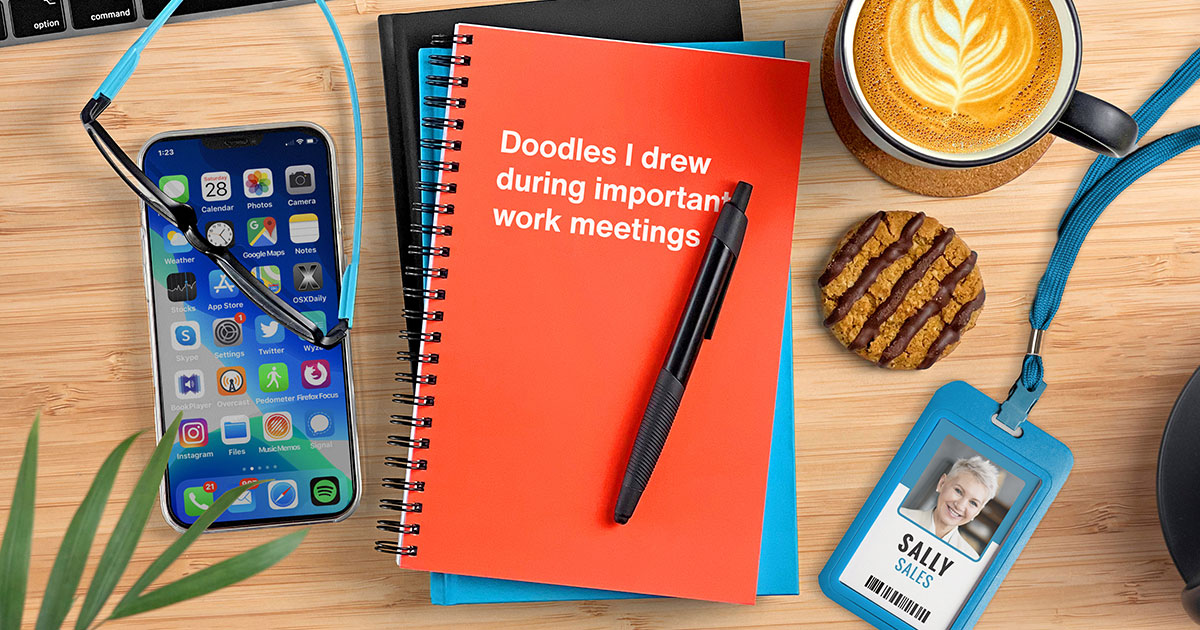 A funny corporate gifting WTF Notebook in an office setting