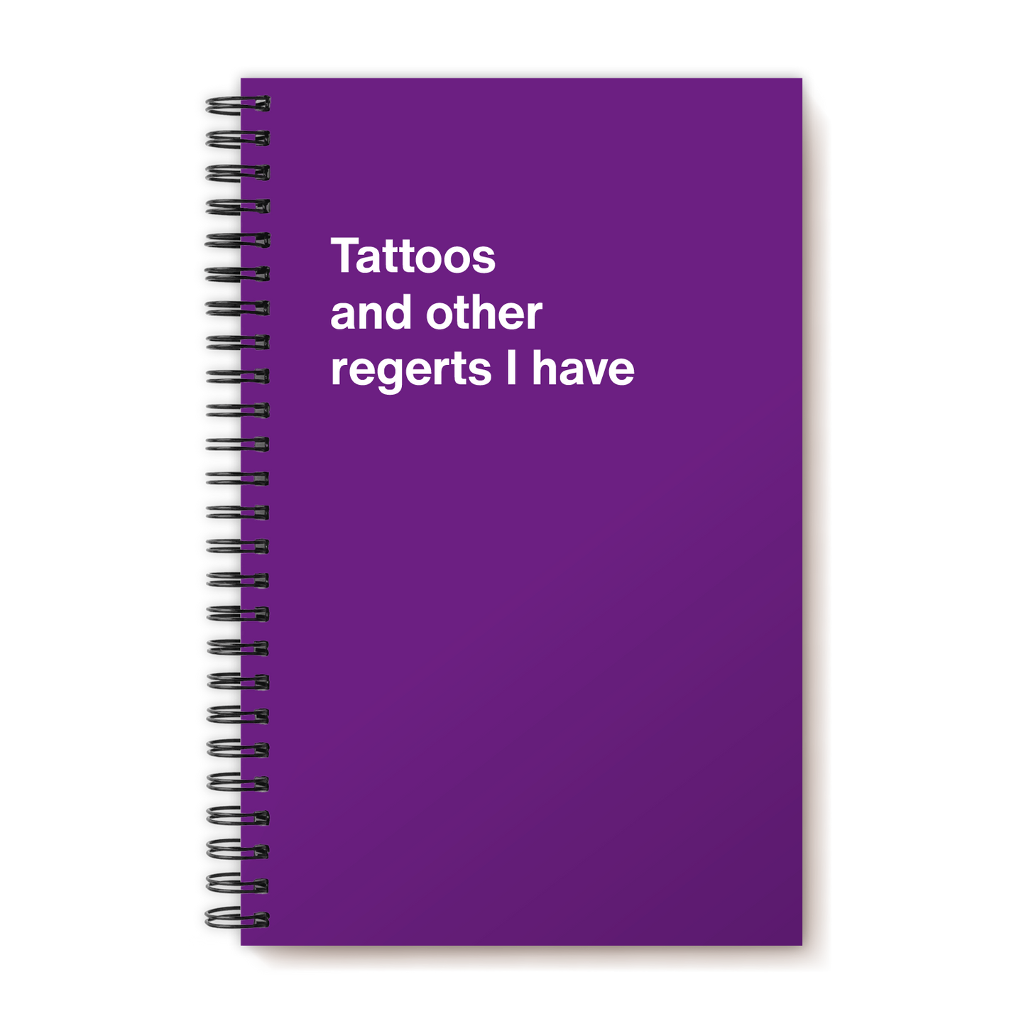 A funny notebook from WTF Notebooks® entitled "Tattoos and other regerts I have"